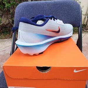 Nike White and Navy Sneakers with Orange Swoosh